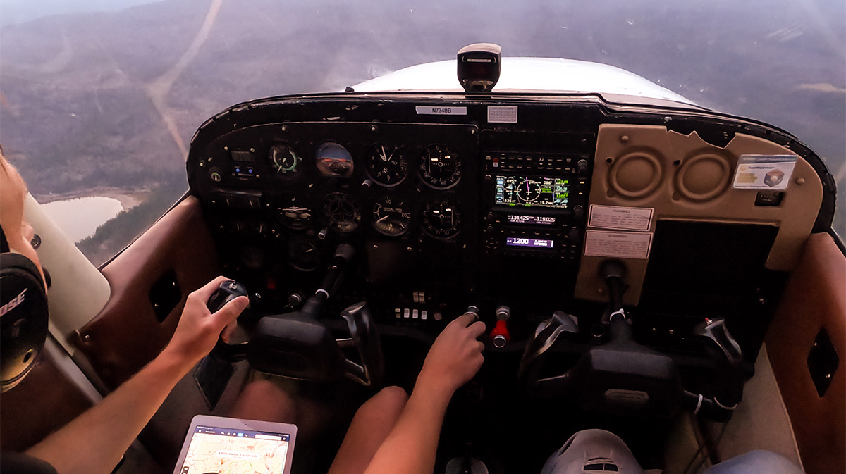 heli pilot POV shot while flying for a blog about crew resource management training
